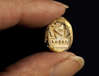 The gold scarab. Photograph: Clara Amit, courtesy of the Israel Antiquities Authority