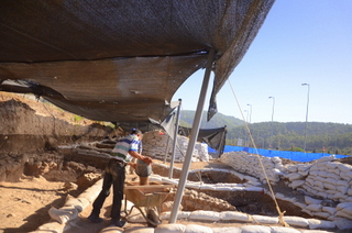 6. Work being conducted at the excavation. Photograph: Yoli Shwarz, courtesy of the Israel Antiquities Authority.