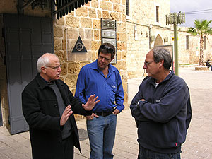 Architect S. Assif with D. Barshad and E. Stern of the IAA during the committee’s tour in Old Acre.