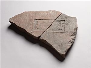 Fired Brick Impressed with Stamp Seal 
 Photographer:Meidad Suchowolski