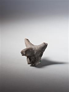 Fragment Figurine Zoomorphic  
 Photographer:Meidad Suchowolski