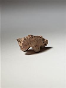 Fragment Figurine Zoomorphic  
 Photographer:Meidad Suchowolski