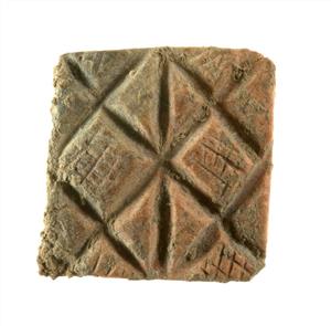 חותם טביעה (Stamp Seal) מעוטר בחריתה
צלם:עמית קלרה
