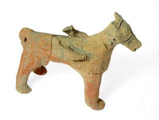 Figurine of a horse. Photograph: Clara Amit, courtesy of the Israel Antiquities Authority