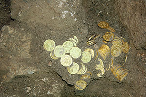 The hoard of coins before it was removed from the excavation area. Photograph: courtesy of the ‘Ir David Foundation.