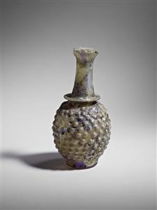 Bottle With Vegetal Decoration 
 Photographer:Meidad Suchowolski