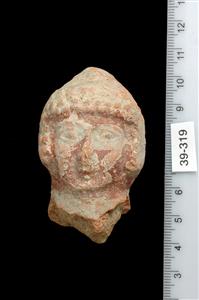 Head Pillar figurine   
 Photographer:Yolovitch Yael