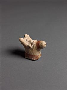 Head Figurine Zoomorphic  
 Photographer:Meidad Suchowolski