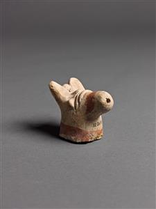 Head Figurine Zoomorphic  
 Photographer:Meidad Suchowolski