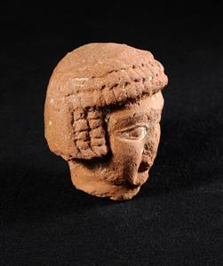 Head Pillar figurine   
 Photographer:Yolovitch Yael