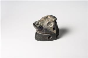 Head Figurine Zoomorphic  
 Photographer:Meidad Suchowolski