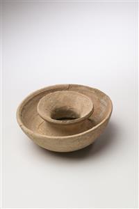 Cup and Saucer  
 Photographer:Meidad Suchowolski
