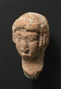 Head Pillar figurine   
 Photographer:Clara Amit