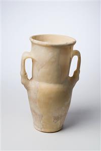 Small Jar Decorated with Animal Heads 
 Photographer:Meidad Suchowolski