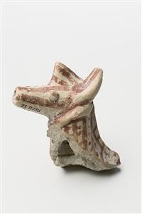 Head Figurine Zoomorphic  
 Photographer:Meidad Suchowolski