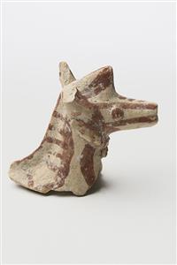 Head Figurine Zoomorphic  
 Photographer:Meidad Suchowolski