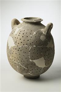 Straining Jar  
 Photographer:Meidad Suchowolski