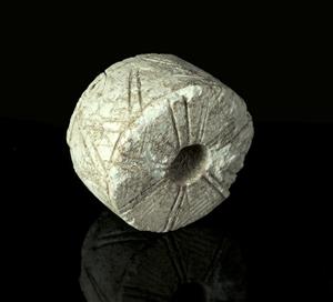 Spindle Whorl Engraved 
 Photographer:Clara Amit